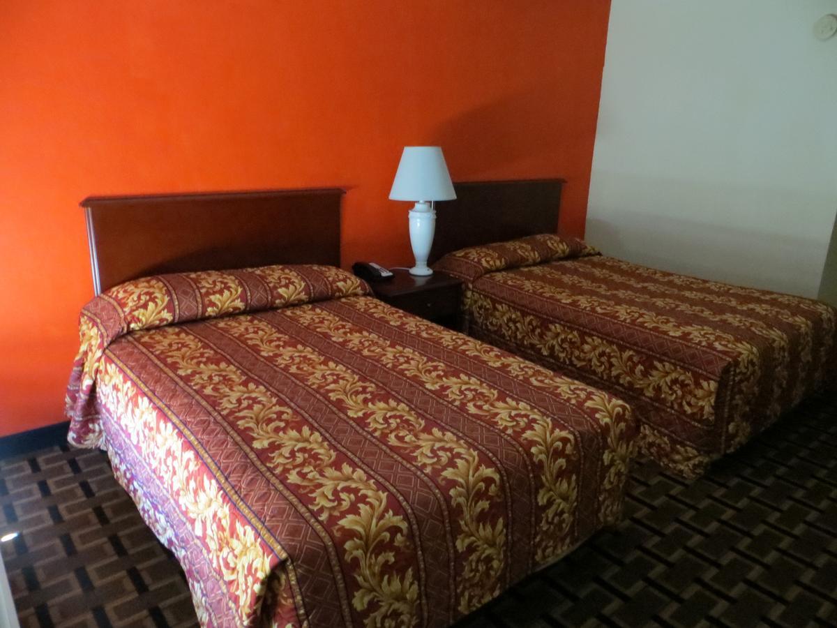 Budget Inn Кокоа Экстерьер фото