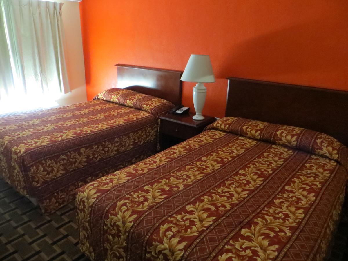 Budget Inn Кокоа Экстерьер фото
