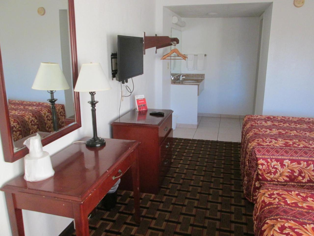 Budget Inn Кокоа Экстерьер фото